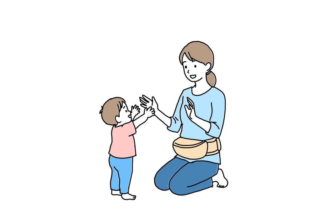 ヒップシートで抱っこ町の子ども